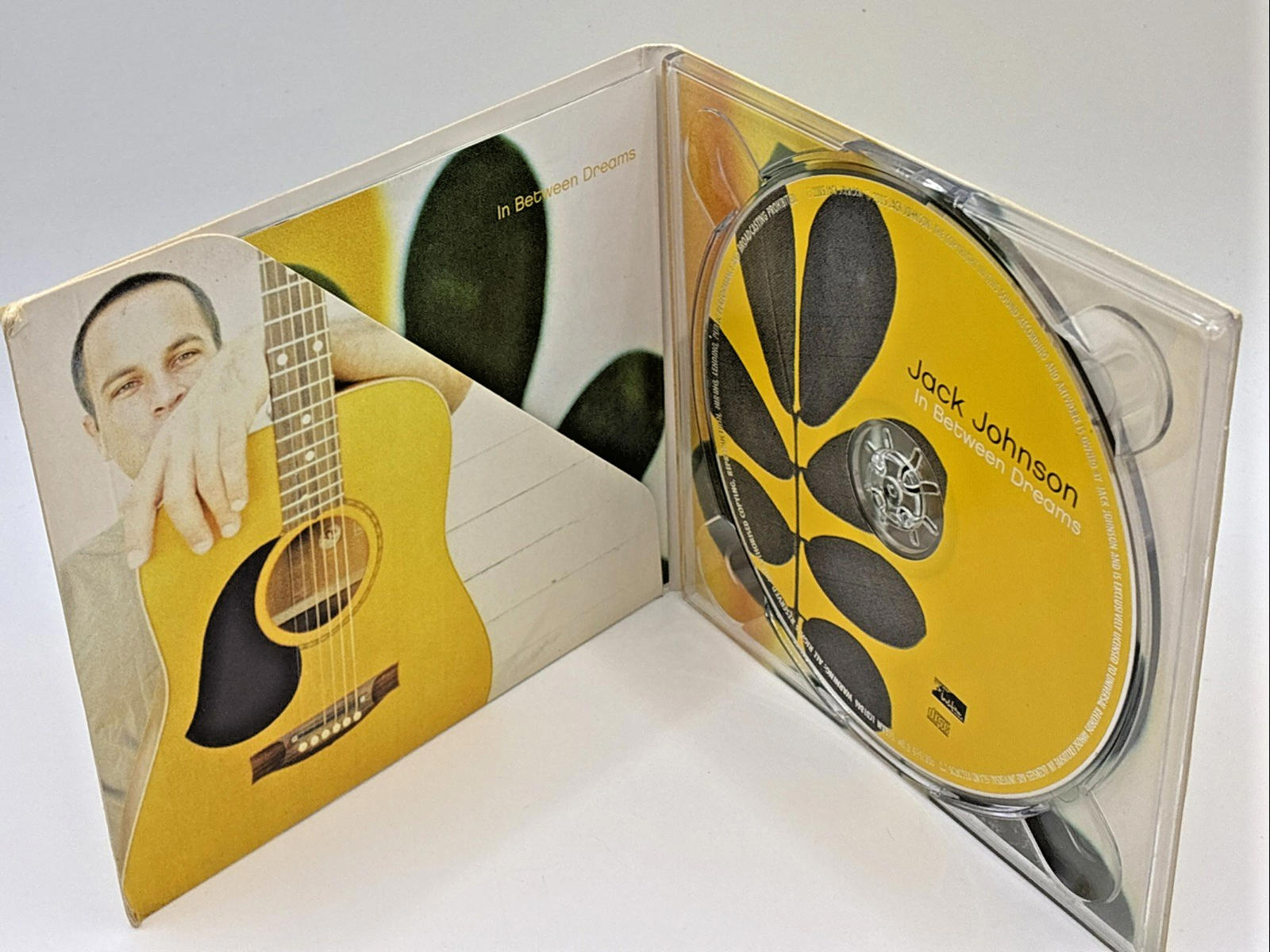 Jack Johnson - In Between Dreams - Jack Johnson Used Refurbished CD